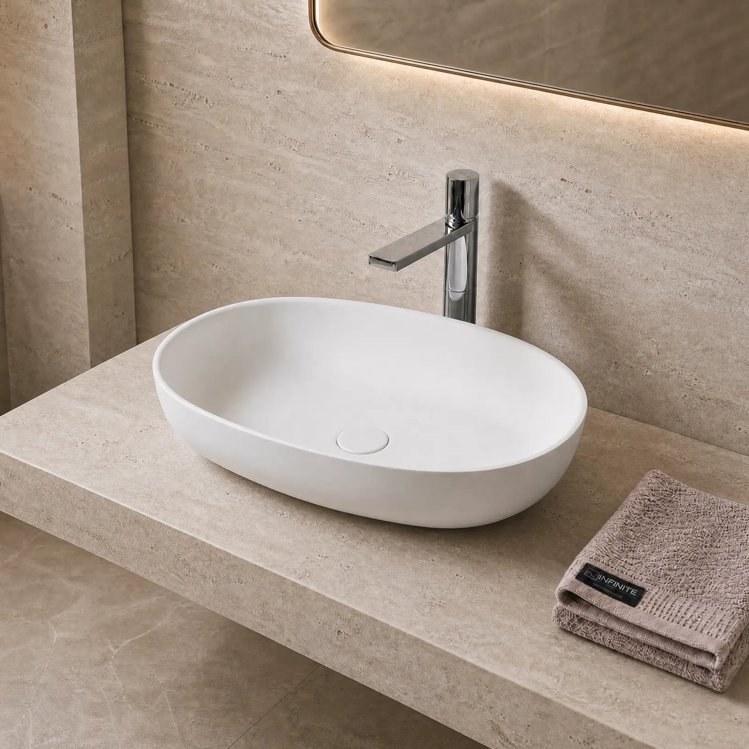 Bathroom Solid Surfaces sink with faucet and towel on a beige countertop