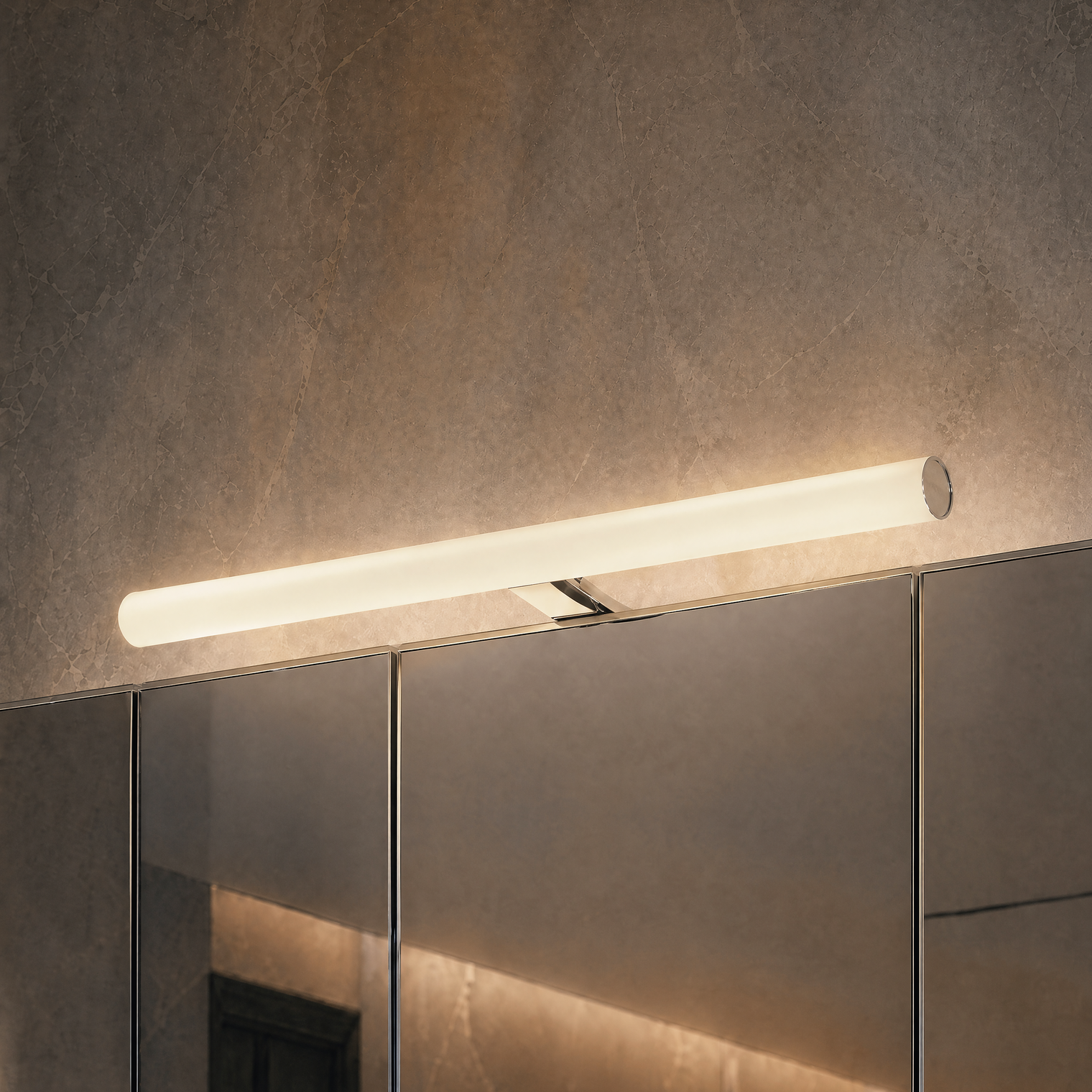 Modern wall-mounted light fixture on a textured wall