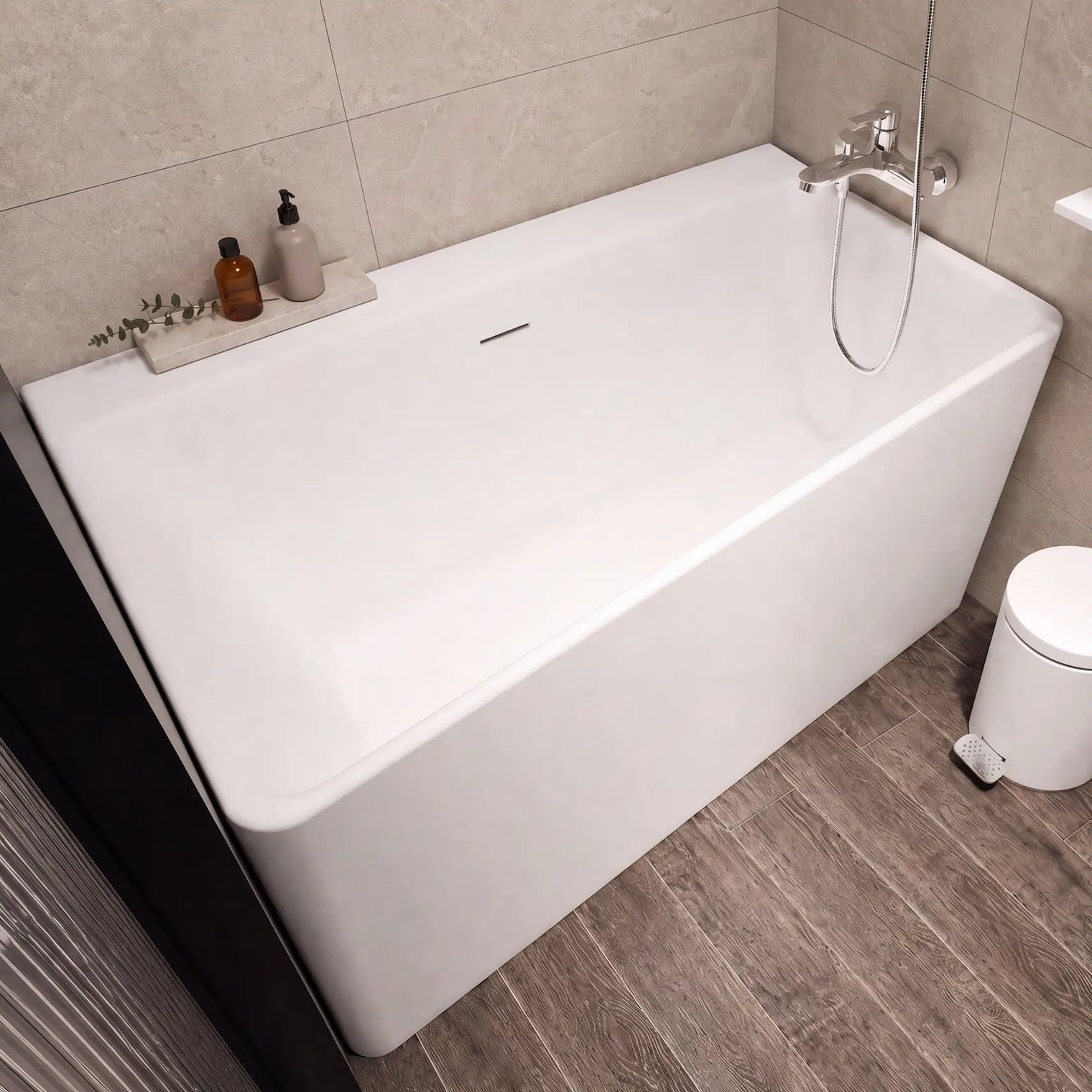 A modern freestanding white bathtub in a tiled bathroom with dark wood-look flooring, wall-mounted floating shelves, a small trash can, and a toilet visible at the right edge.