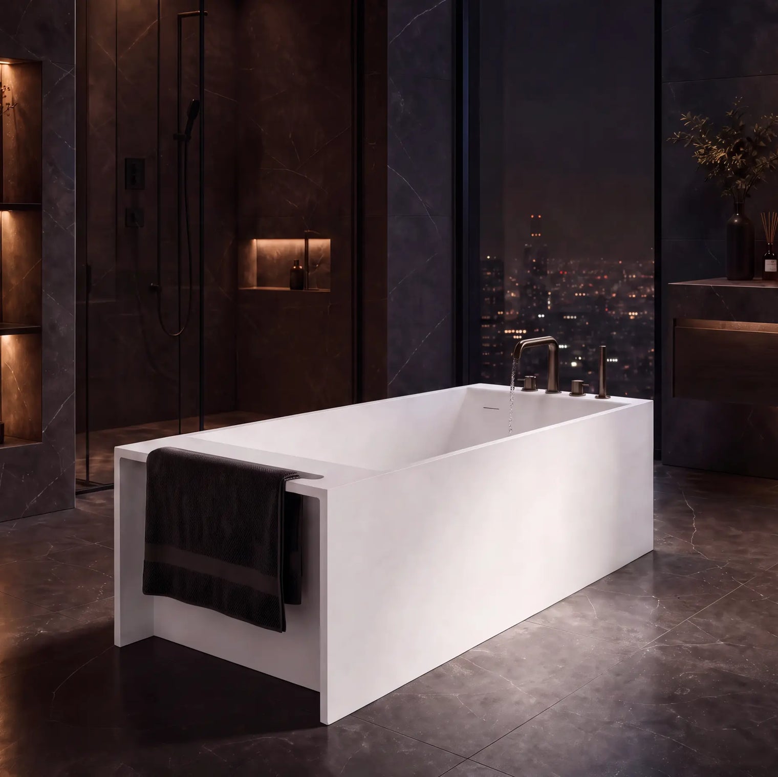 A modern freestanding rectangular bathtub in matte white, shown in a luxurious dark-toned bathroom with a city skyline visible through large windows at night.