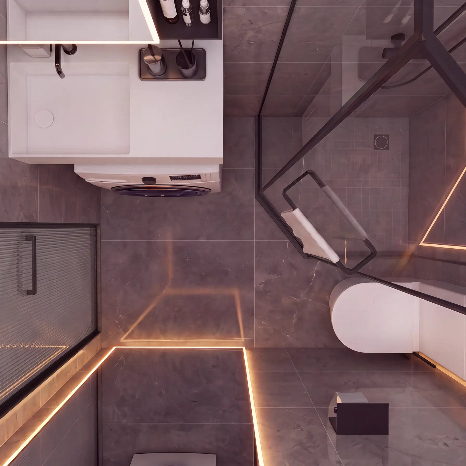 Modern bathroom interior with gray stone-look tiles, warm LED strip lighting, a white toilet, a white vanity unit, and a glass shower screen with black framing.