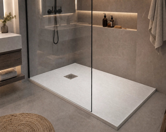 Modern shower with a flat floor and built-in shelves in a bathroom setting.