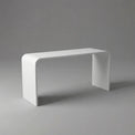 White modern bench on a gray background