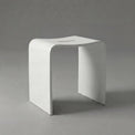 White stool on a gray background