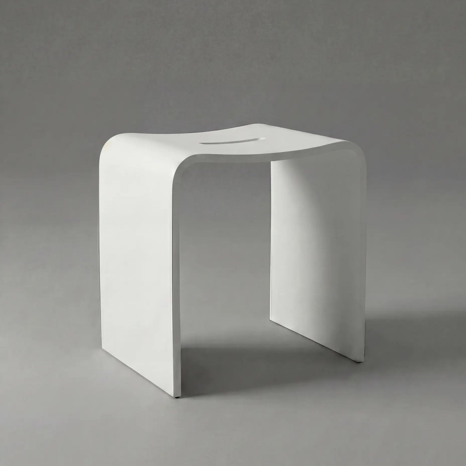 White stool on a gray background