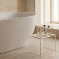 Modern bathroom with a freestanding bathtub near a window