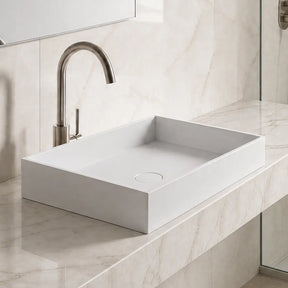 Modern bathroom with marble vanity and solid surfaces basin