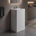 Modern bathroom with a freestanding sink and bathtub.