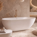 A modern freestanding oval bathtub in a minimalist beige stone bathroom with a matching round side table, pendant lights, a built-in vanity with a backlit oval mirror, and dried pampas grass decor.