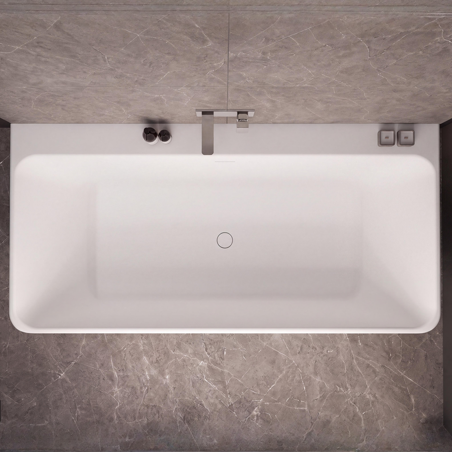 Top-down view of a modern white rectangular bathtub with a chrome faucet, set against dark gray marble-look tiled walls and floor.