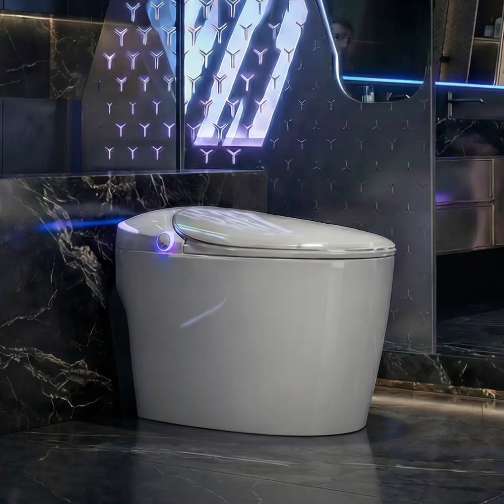 Modern bathroom with a toilet and shower area, featuring a woman sitting on a chair.