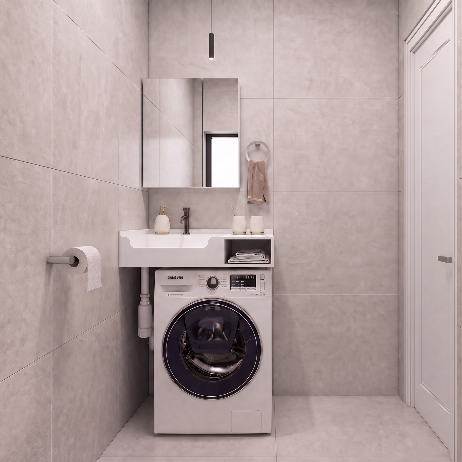 A compact bathroom setup featuring a white front-loading washing machine integrated beneath a matching white sink and mirror, set against light gray tiled walls and floor.