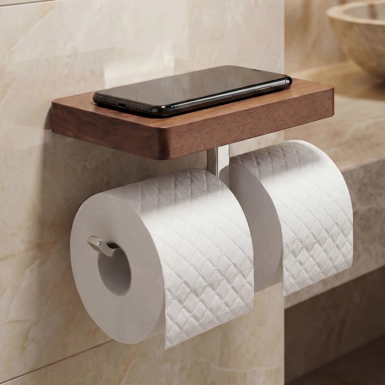 Wooden shelf with a smartphone and toilet paper holder in a bathroom setting.