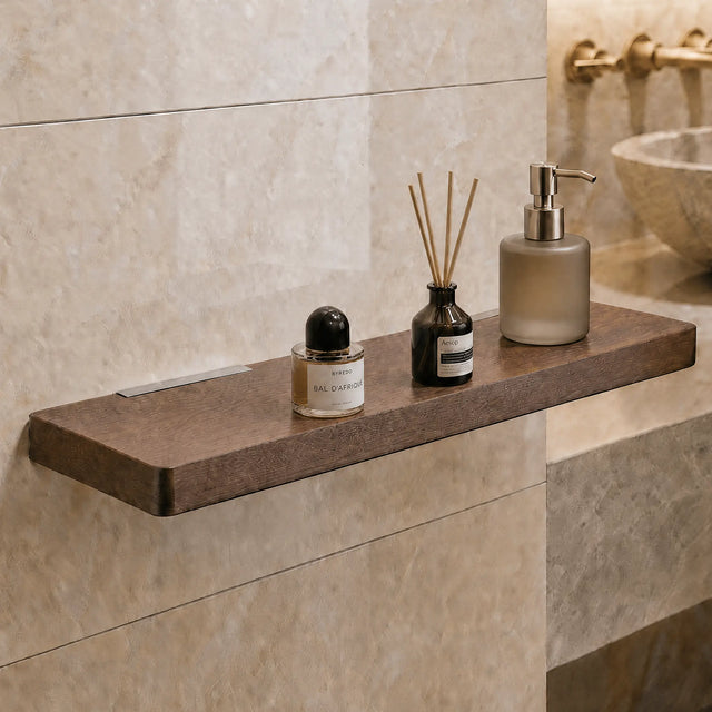 Bathroom counter with a wooden shelf holding skincare products against a tiled wall.