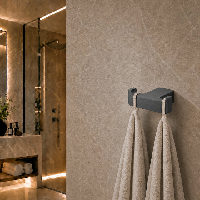 Towel rack with towels on a textured wall in a bathroom setting