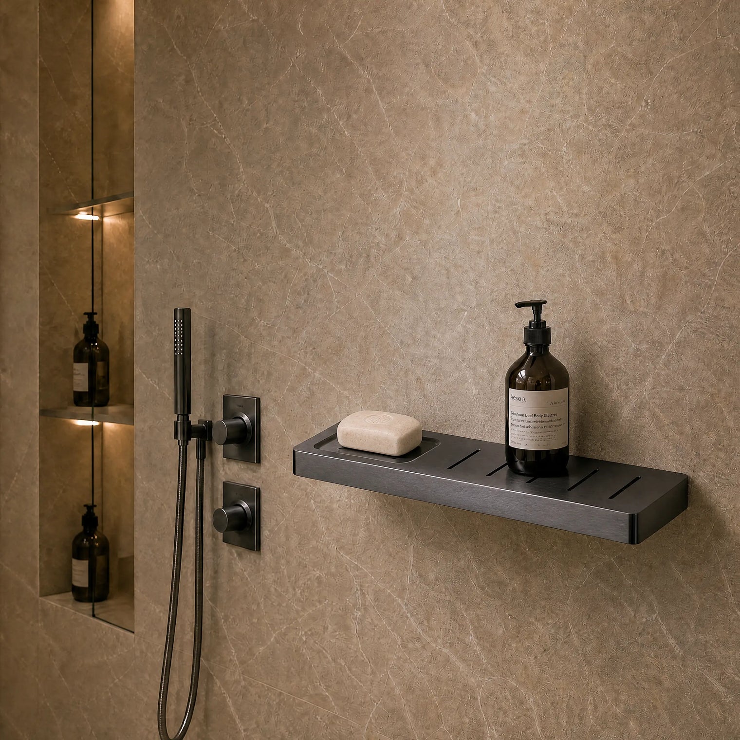 Modern bathroom with shower setup and toiletries on a shelf.