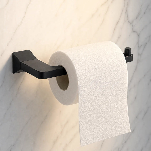 Roll of toilet paper on a black wall-mounted holder against a marble wall.