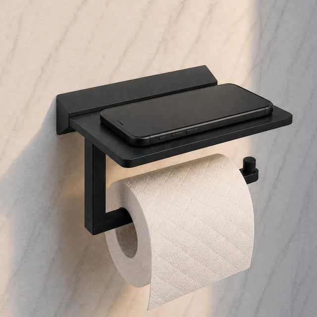 Black wall-mounted toilet paper holder with a roll of toilet paper on a light wooden background