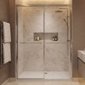 Modern bathroom with shower, sink, and towel rack.