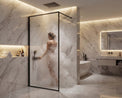 Modern bathroom with marble walls and a freestanding bathtub.