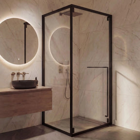 Modern bathroom with shower enclosure, round mirror, and wooden vanity.
